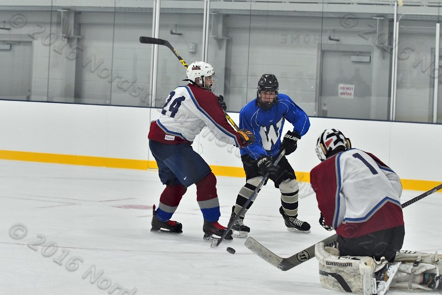Wheaton College Men\'s Ice Hockey vs Middlesex Community College. - Photo By: KEITH NORDSTROM